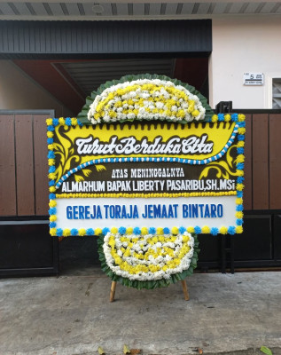 Papan Bunga Duka di Bulik Timur